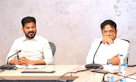 Chief Minister A Revanth Reddy along with Industries Minister D Sridhar Babu.