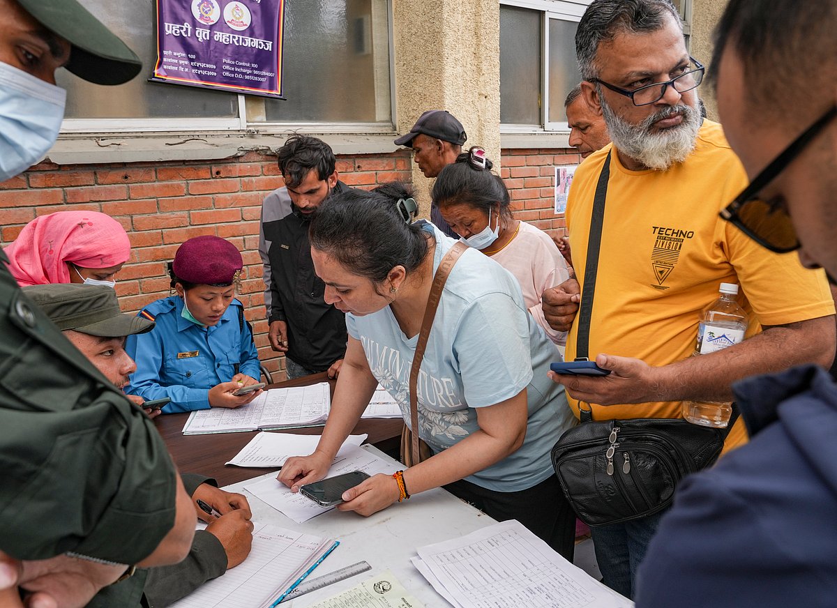 Nepal sets up temporary storage as bodies recovered downstream overwhelm morgues