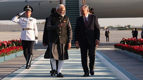 Prime Minister Narendra Modi with Uzbekistan President Shavkat Mirziyoyev.