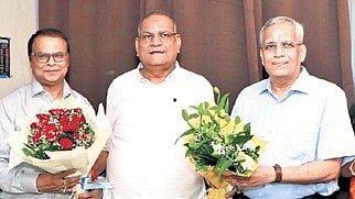 Prof Gopal Krushna Nayak felicitated by founder chairman Pramod Chandra Rath and members of the university’s Board of Management.