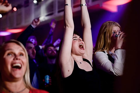 Supporters of the Yes campaign celebrate after Reykjavik results put their side into a narrow nationwide lead during an election-night gathering in Reykjavik, Iceland, Sunday, Aug. 30, 2026.