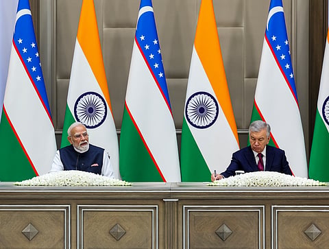  Prime Minister Narendra Modi and Uzbekistan President Shavkat Mirziyoyev during the joint press meet after the exchange of MoUs, in Tashkent, Uzbekistan. 