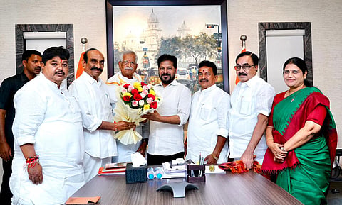 Chief Minister A Revanth Reddy felicitates Agriculture and Farmers Welfare Commission Chairman M Kodanda Reddy and others in Hyderabad on Saturday.