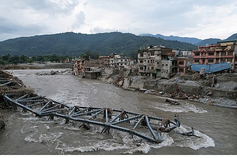 A drone view of the aftermath of flash flooding along the Trishuli River in the Devighat area of Nuwakot district, Nepal, Saturday, Aug. 29, 2026. 