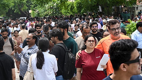 Aspirants leave from an examination centre after appearing in the NEET-PG 2026 examination, in New Delhi, Sunday, Aug. 30, 2026.