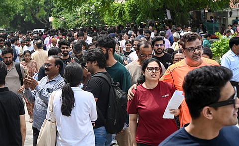 Aspirants leave from an examination centre after appearing in the NEET-PG 2026 examination, in New Delhi, Sunday, Aug. 30, 2026.