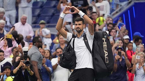 Novak Djokovic, of Serbia, gestures to the crowd after he lost to Mariano Navone, of Argentina, during the first round of the U.S. Open tennis championships Sunday, Aug. 30, 2026, in New York.