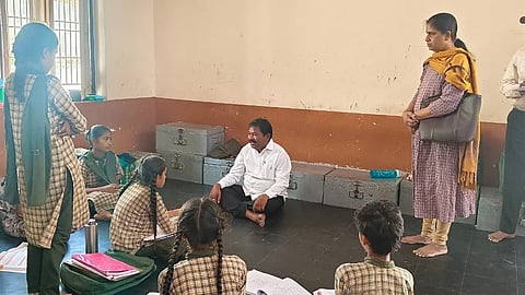 Social Welfare Minister Dola Sree Bala Veeranjaneya Swamy during a surprise visit to the SC Girls Hostel in Markapuram on Sunday.