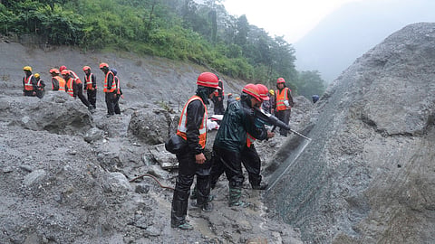 Nepal Army soldiers using a drilling machine during a rescue operation at the site of a hydropower project in Upper Trishuli, Nepal, Sunday, Aug. 30, 2026.