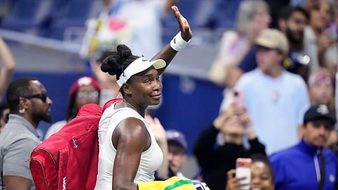 Venus Williams, of the United States, waves as she leaves the court following her first round loss to compatriot Sofia Kenin at the U.S. Open tennis championships, Monday, Aug. 31, 2026, in New York. 
