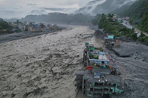 A drone view of the aftermath of flash flooding along the Trishuli river amidst fresh water surge warning in the Trishuli Bazaar area of Nuwakot district, Nepal, Sunday, Aug. 30, 2026.