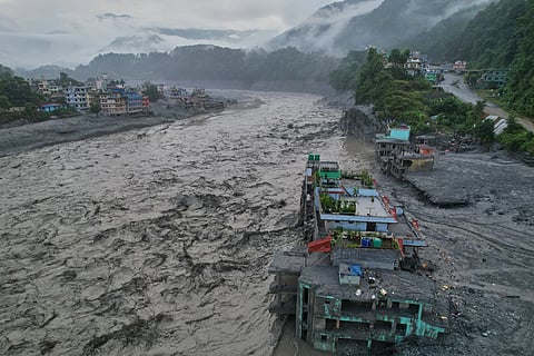 A drone view of the aftermath of flash flooding along the Trishuli river amidst fresh water surge warning in the Trishuli Bazaar area of Nuwakot district, Nepal, Sunday, Aug. 30, 2026.