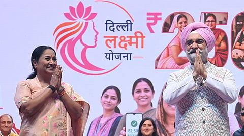 Delhi Lieutenant Governor Taranjit Singh Sandhu and Delhi Chief Minister Rekha Gupta during the launch of Delhi Lakshmi Yojana at Talkatora Stadium.