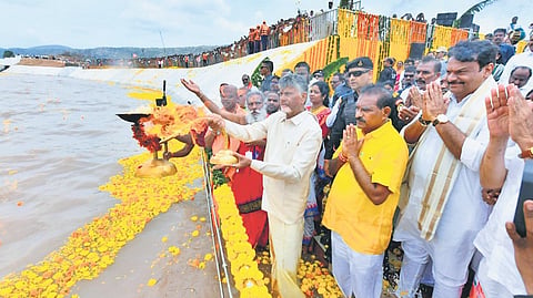 CM N Chandrababu Naidu performs ‘Jala Harati’ to Krishna waters during the inauguration of plase-1 of Poola Subbaiah Veligonda Project on Monday.