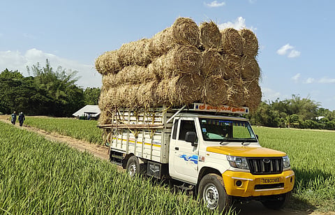 A mini truck laden with paddy straw bundles near Kumbakonam  