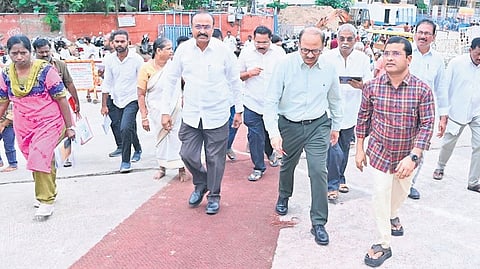 Endowments Department Secretary K Kannababu and Commissioner K Ramachandra Mohan inspect development works at Durga temple in Vijayawada.