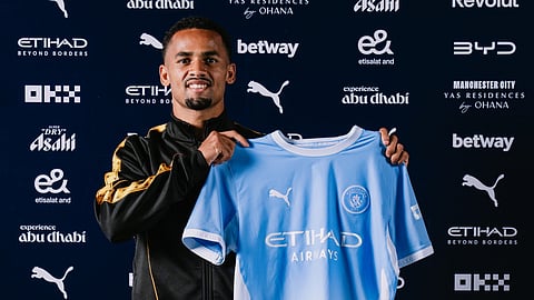 Iliman Ndiaye with the Man City jersey
