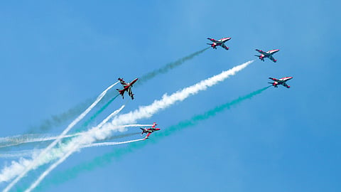 In this photo from Feb. 14, 2025, the Suryakiran Aerobatic Team of the Indian Air Force perform during 'Aero India 2025', at Yelahanka Air Force Station in Bengaluru.