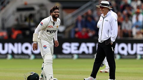 Pakistan's Imam-ul-Haq reacts to an injury on the opening day of the first test match between England and Pakistan at Headingley cricket ground in Leeds, northern England on August 19, 2026.