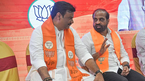 Health minister Satya Kumar Yadav (R) and BJP state president PVN Madhav during the Seva, Sankalp, Utsavalu meeting in Vijayawada on Tuesday.