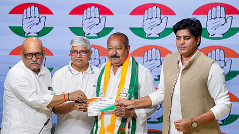  AIMIM national spokesperson Syed Asim Waqar, second right, joins the Congress in the presence of Uttar Pradesh AICC In-charge Rajendra Pal Gautam, second left, UP Congress chief Ajay Rai, left, and AICC Minority Department chairman Imran Pratapgarhi, right, during an event, at AICC office, in New Delhi, Wednesday, Sept. 2, 2026