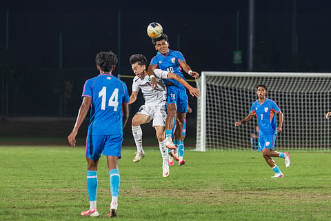 Action during the Uzbekistan vs India match
