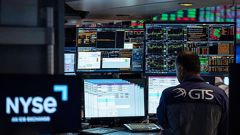 Specialists Dilip Patel works on the floor of the New York Stock Exchange, Thursday, Aug. 27, 2026, in New York. 