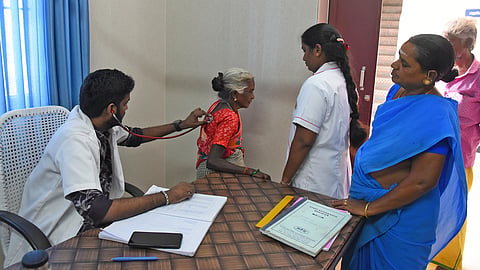 A doctor and nurse attend to a patient at the Kuzhumikkarai UPHC in Tiruchy on Thursday, after they were posted following a TNIE report 
