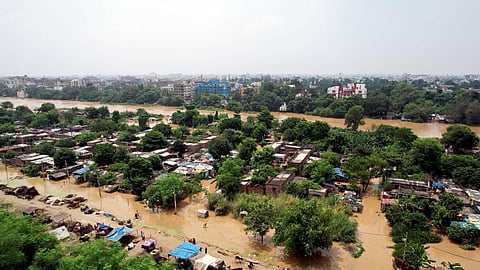 An aerial view of the flood-affected Bind Toli as the water level of the Ganga River rises amid the monsoon season, in Patna on Thursday, Sept. 03, 2026.