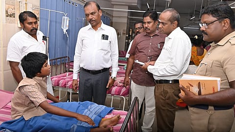 Pudukkottai chief education officer K Shanmugam visiting the injured students at the government medical college hospital.