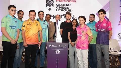 (L to R): Yağız Kaan Erdoğmuş, Arjun Erigaisi, Levon Aronian, Viswanathan Anand, Gourav Rakshit, Commissioner -Tech Mahindra Global Chess League; Peeyush Dubey, Chairperson -Tech Mahindra Global Chess League; Magnus Carlsen, Divya Deshmukh, Javokhir Sindarov, Maxime Vachier-Lagrave and Alexandra Kosteniuk. 
