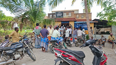Liquor consumers outside one of the Tasmac shops in Alampoondi