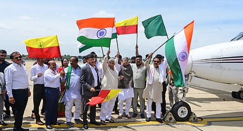 Water Resources Minister N Cheluvarayaswamy and others flag off the special light aircraft prepared for cloud-seeding at HAL Airport in Bengaluru on Friday 