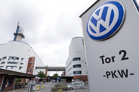 The VW logo in front of the Volkswagen plant in Osnabrueck, Germany, Wednesday, Aug. 26, 2026
