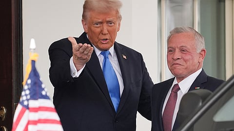President Donald Trump greets Jordan's King Abdullah II 
