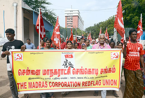 Workers affiliated with the CITU’s Madras Corporation Redflag Union staging  a protest at Ripon building on Thursday 