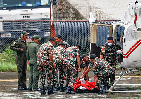  Nepal Army personnel shift Sanjay Sah, a rescued victim from Trisuli 3A Hydropower Project, to a hospital at Chhauni, in Kathmandu, Nepal, Friday, Sept. 4, 2026. Two men, identified as Kabir Maharjan, 45, and Sanjay Sah, 30, have been rescued alive from a tunnel at the Trishuli 3A hydropower project 10 days after the Bhotekohi flash floods disaster.