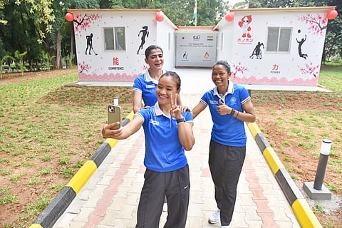 Hockey players outside the container-like accommodation in NCOE, Bengaluru