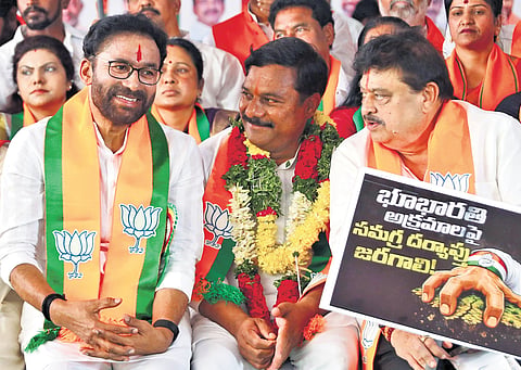 BJP leaders G Kishan Reddy, Alleti Maheshwar Reddy & N Ramchander Rao during Maha Deeksha near Indira Park in Hyderabad on Saturday.