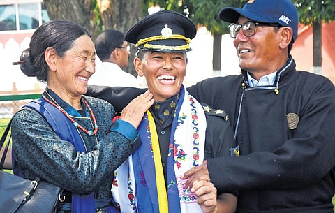 Stanzin Tsangyang with her parents Tundup Tsering and Rigzin Ladol at the Officers Training Academy in Chennai on Saturday 