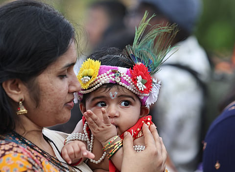 Little Krishnas, Radhas paint the city in Janmashtami hues