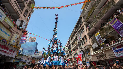 'Govinda Pathaks' form a human pyramid during a 'Dahi Handi' event organised on the 'Janmashtami' festival, at Dadar, in Mumbai, Saturday, Sept. 5, 2026. 