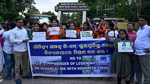 Student protest against the merger of DM School with KV School, outside Regional Institute of Education in Bhubaneswar on Thursday.