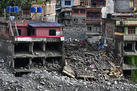 Flash flood survivors look for salvageable belongings at Trishuli Bazar in Nepal's Nuwakot district on September 5, 2026.