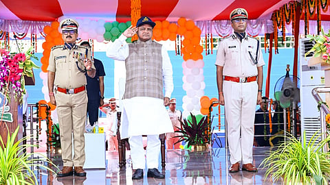 Chief Minister Mohan Charan Majhi takes salute during the passing out parade of new police sub-inspectors at the Biju Patnaik State Police Academy.