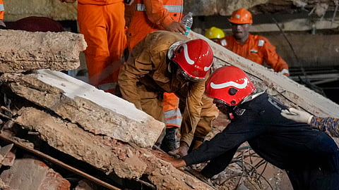 i: Rescue operation underway after a 50-year-old five-storey building housing a boys' hostel collapsed in a congested bylane in Satya Niketan near Delhi Universitys south campus, Sunday, Sept. 6, 2026. 