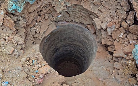 A well lies beneath the debris of a demolished mosque, in Saharanpur, Uttar Pradesh, Sunday, Sept. 6, 2026. 