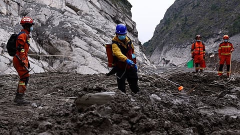 Rescue workers conduct search and rescue operations at the core disaster-hit area at Gyirong Port during an organised media tour in Shigatse, Tibet Autonomous Region, China, Sunday Sept. 6, 2026.
