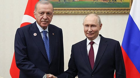 Russian President Vladimir Putin, right, and Turkish President Recep Tayyip Erdogan pose for a photo during their meeting on the sidelines of the Shanghai Cooperation Organization (SCO), in Bishkek, Kyrgyzstan, on Tuesday, Sept. 1, 2026.