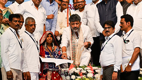 Chief Minister DK Shivakumar receives application forms from the public during the Praja Seva launch at Kudligi in Vijayanagara district on Saturday.